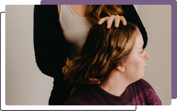 chiropractor adjusting patient's neck