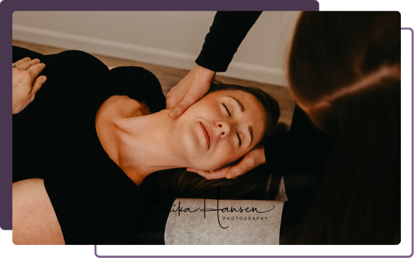 Chiropractor helping patient with neck