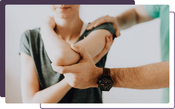 chiropractor checking on a sports injury