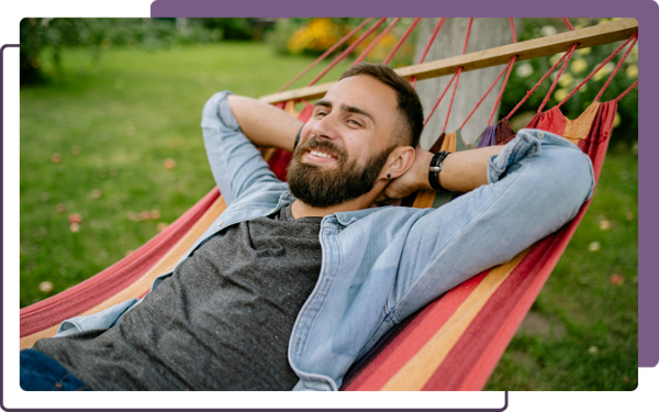 man relaxing on a hammock 