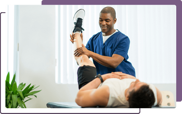 chiropractor with patient, evaluating range of motion