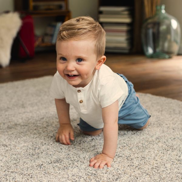 image of a toddler crawling