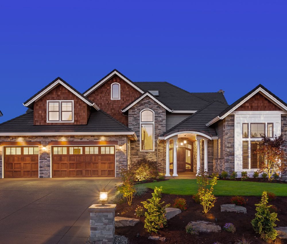 a large home at night Waxhaw Custom Home Builders (4).jpg