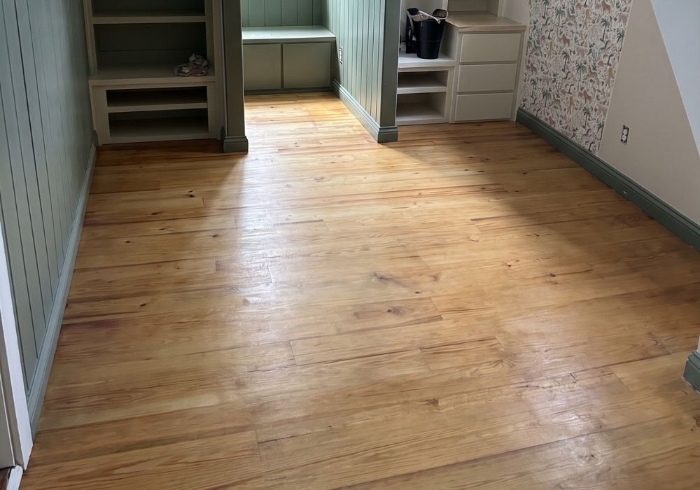 Room with refurbished hardwood flooring