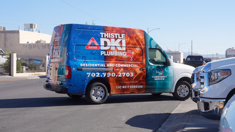 Thistle DKI work van parked on a Las Vegas street