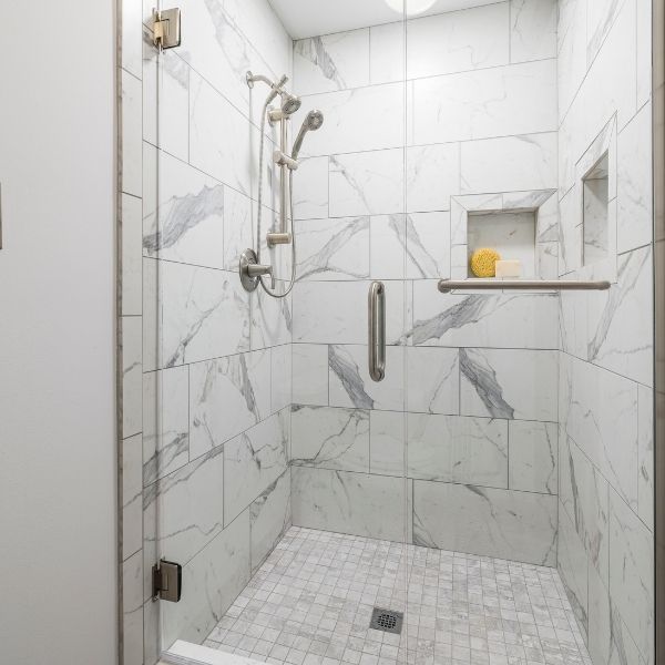 inside of shower with beautiful tile