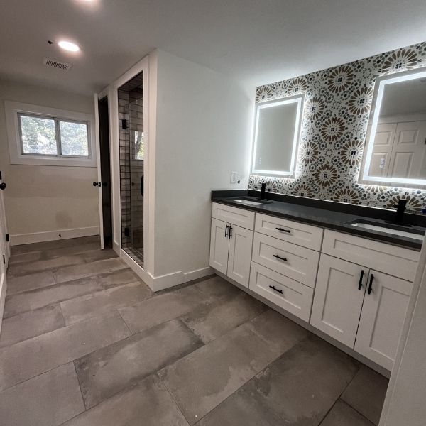 a remodeled bathroom with unfinisjed flooring