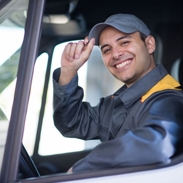 smiling non-emergency transportation driver