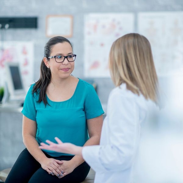 woman meeting with medical provider