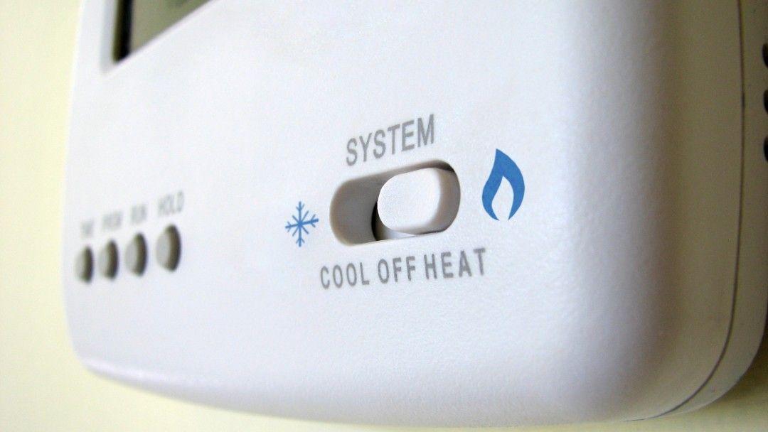 image of a therostat reading cool, off, and heat