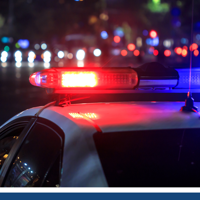 Police Car with lights on at night