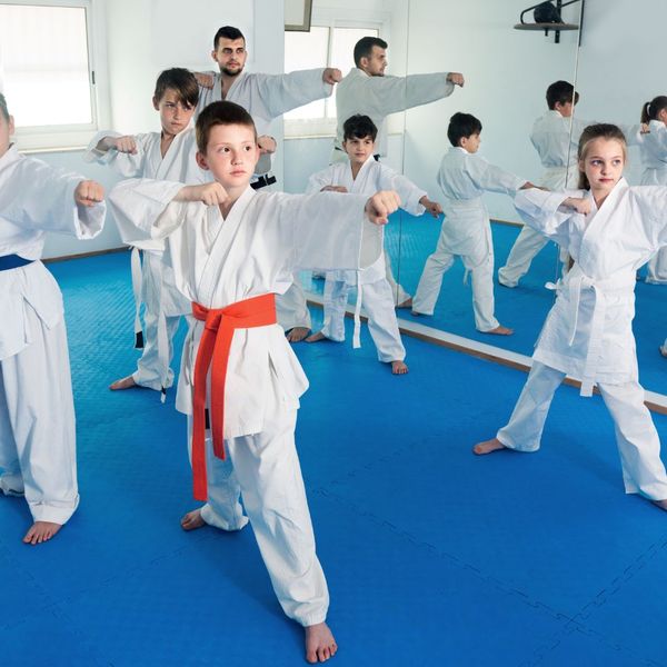 kids with karate instructor