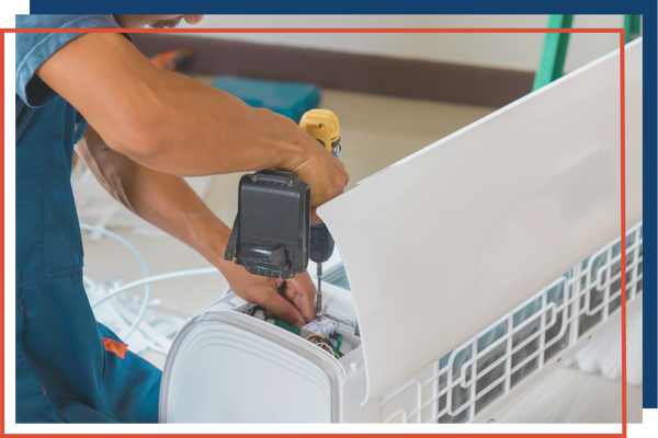 Person repairing an AC unit