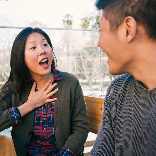 Woman talking to man