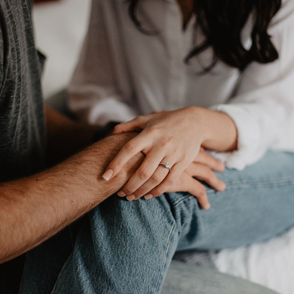 Couple holding hands. 