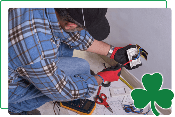 electrician fixing outlet