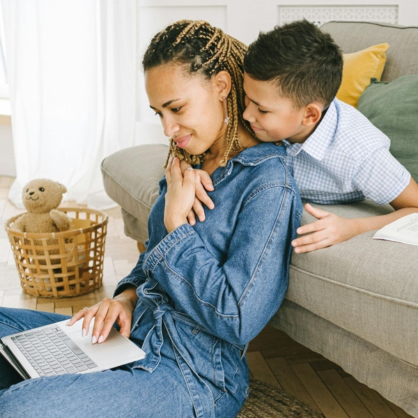 woman and son comfortable in their home