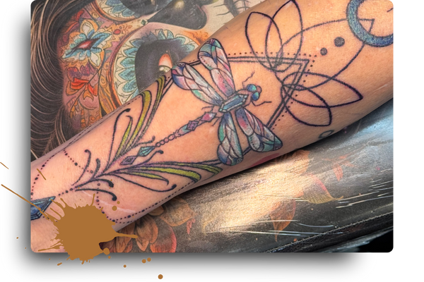 delicate dragonfly tattooo