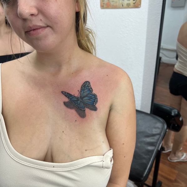 Woman with a butterfly tattoo