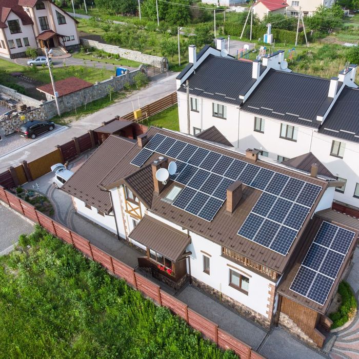 modern house with solar panels on roof