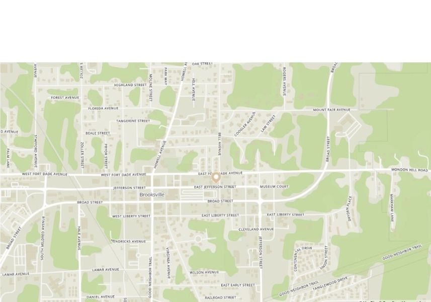 A light-colored map illustrating the street network and landscape of the Brooksville area, with prominent roads like Broad Street and Bell Avenue, indicating residential and commercial zones.