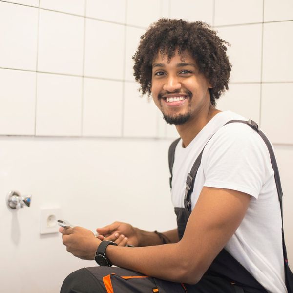 A smiling plumber 