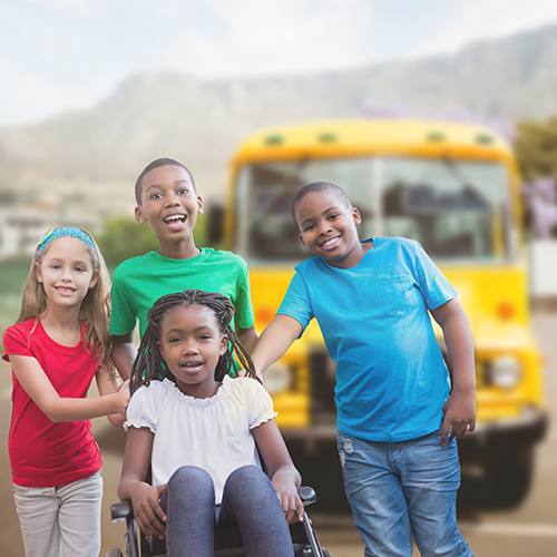 Kids In front of school bus