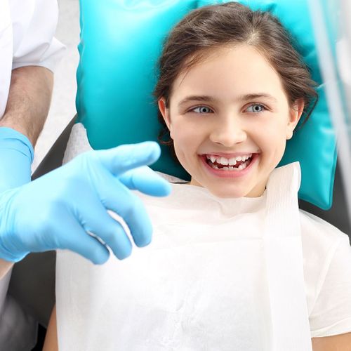 young girl getting dental sealants