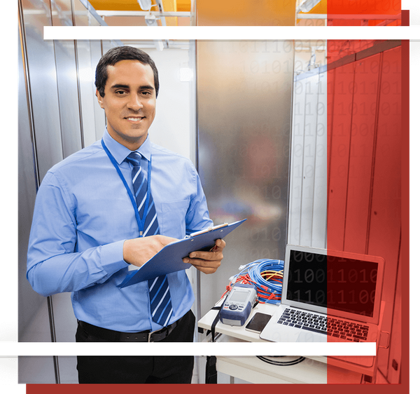 Tech professional working in server room