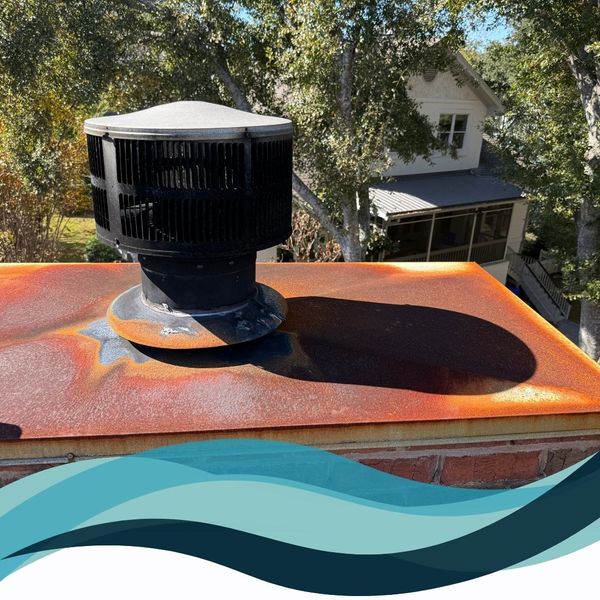 chimney cap, rusting roof
