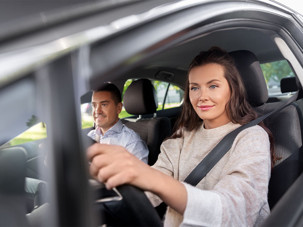 Woman learning how to drive