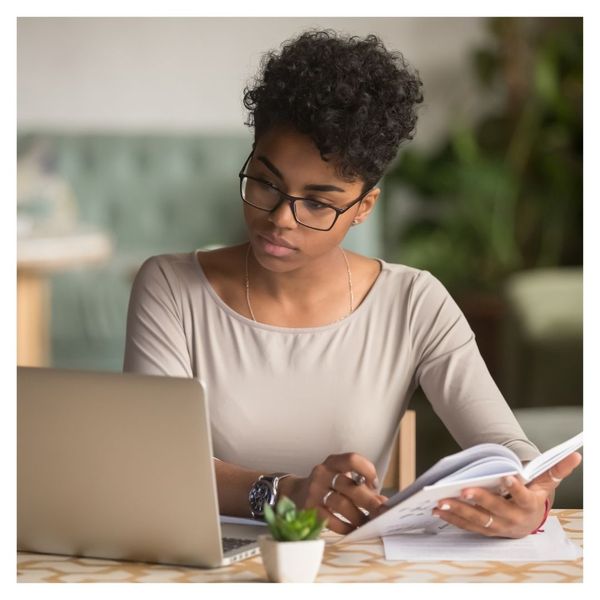 woman researching on computer