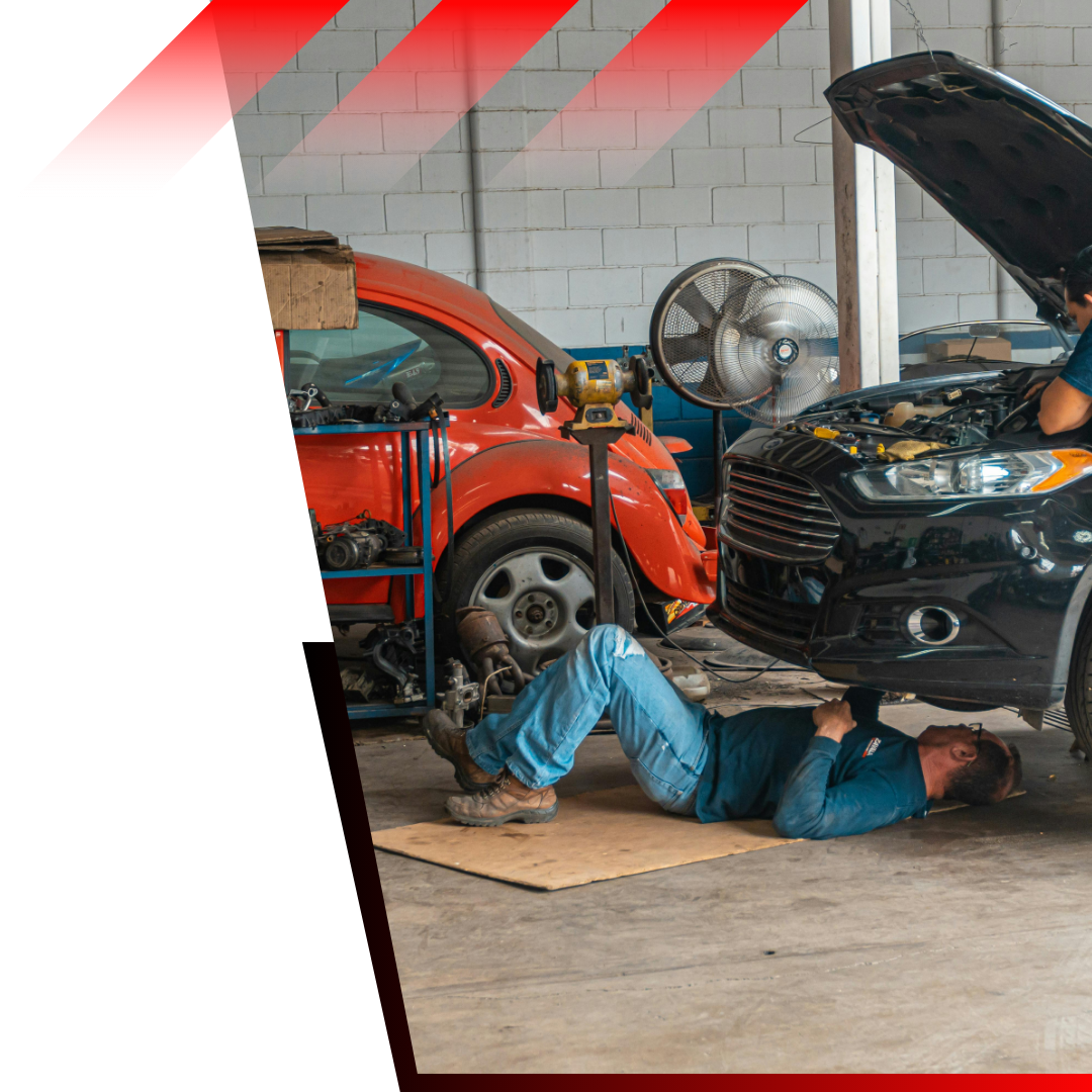 mechanic working under a car