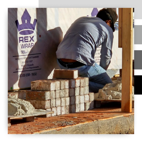 laying bricks