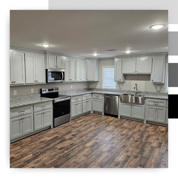 newly remodeled kitchen, gray cabinets and laminate flooring