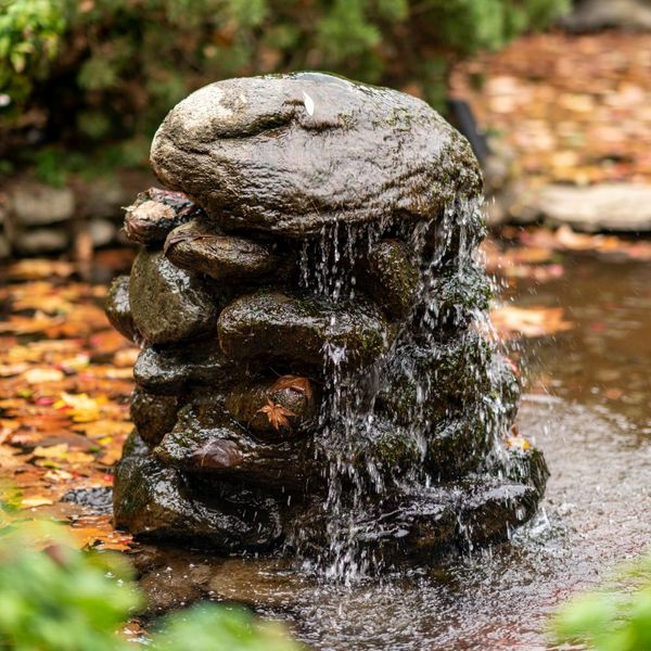 a rock water feature Top Summer Landscaping Ideas to Beat the Heat in St Paul (3).jpg