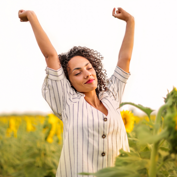 woman stretching and looking energized. 