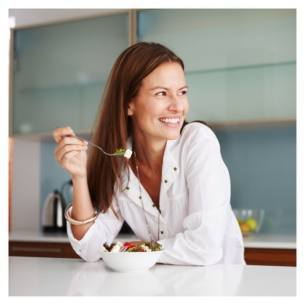 woman eating a salad