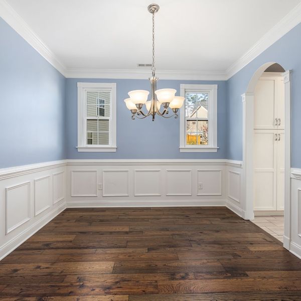 dining room with wainscoting