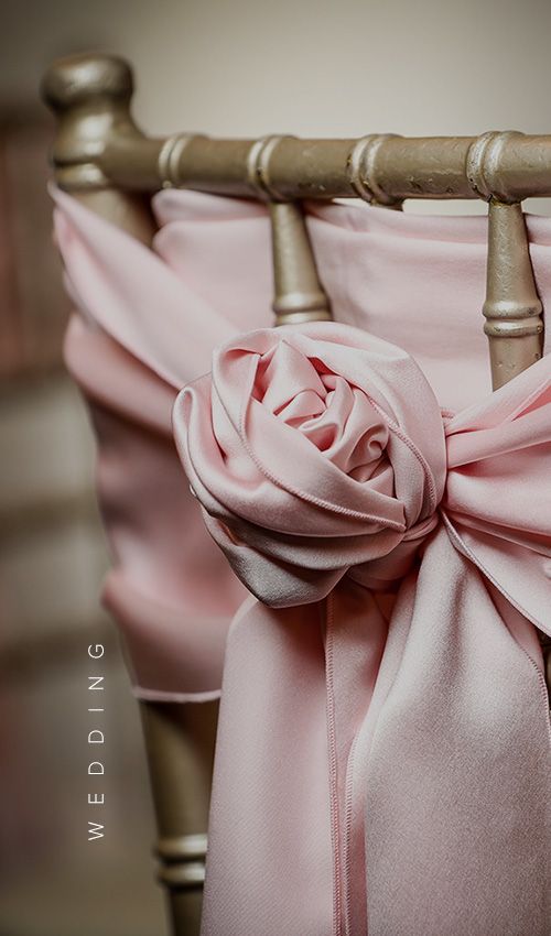 A decorated chair at a wedding