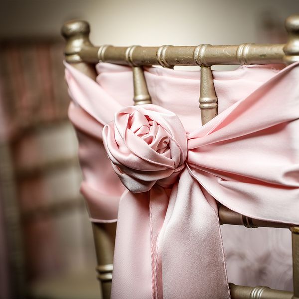 A decorated chair at a wedding venue