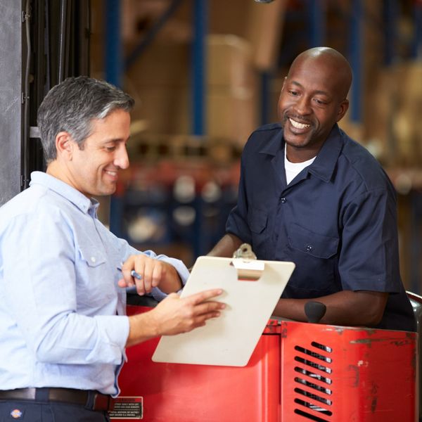 Shipping workers looking at an order