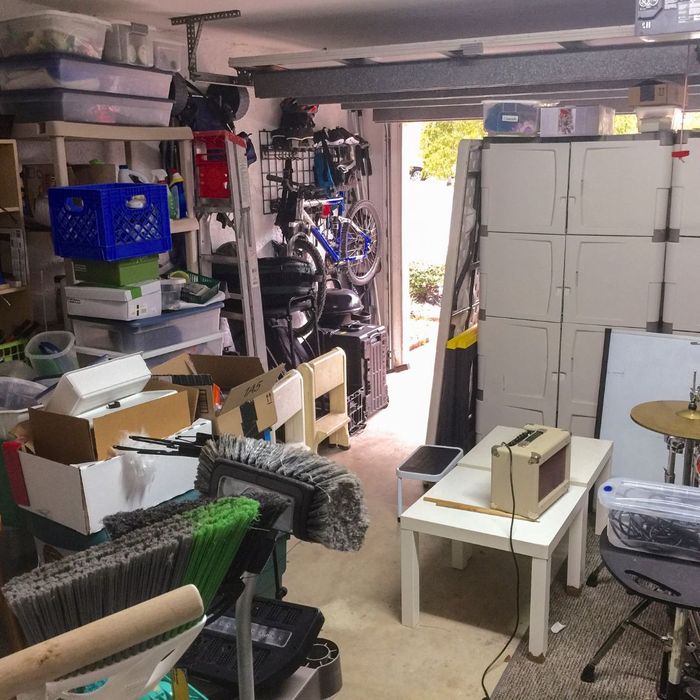 garage cluttered with boxes and old toys