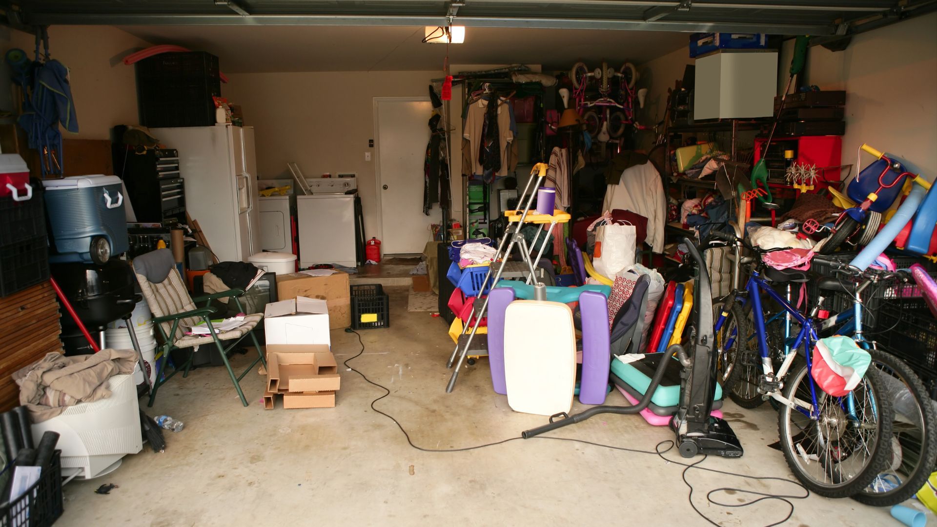 garage cluttered with toys and boxes