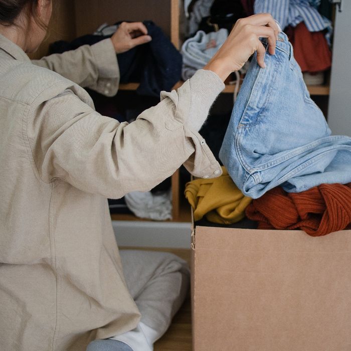 Woman packing up boxed for removal