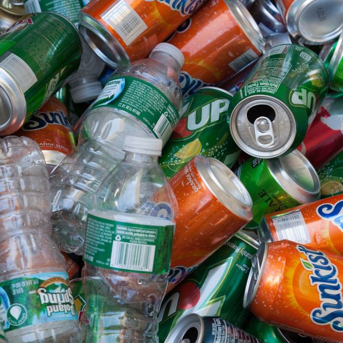close up of recyclable cans and plastic bottles 