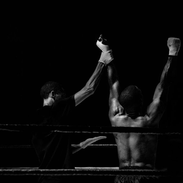 Boxer after winning a match The Role of Past Experiences in Shaping Athletes' Present Mindset3.jpg