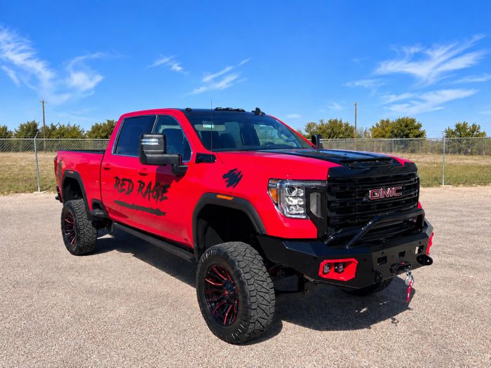 Truck-image-with-power-steps,-lift,-AT-tires,-wheels,-replacement-front-bumper-and-winch.jpg