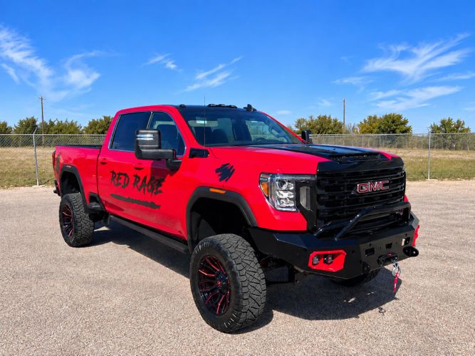 Truck-image-with-power-steps,-lift,-AT-tires,-wheels,-replacement-front-bumper-and-winch.jpg