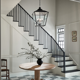 chandelier over table in foyer